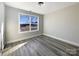 Spacious bedroom with hardwood floors and large window at 1324 Crawford Rd # 6, Rock Hill, SC 29730
