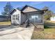 Gray house with a black roof, steps, and porch at 1324 Crawford Rd # 6, Rock Hill, SC 29730