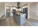 Modern kitchen with island and stainless steel appliances at 1324 Crawford Rd # 6, Rock Hill, SC 29730