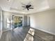 Main bedroom with sliding glass doors and hardwood floors at 1324 Crawford Rd # 6, Rock Hill, SC 29730