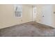 Bedroom featuring neutral paint, carpet and a window at 1418 Nottingham Rd, Kannapolis, NC 28081