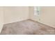 Bedroom with beige carpet, neutral walls, and a window at 1418 Nottingham Rd, Kannapolis, NC 28081