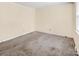 Bedroom features neutral walls, carpet, and natural light from the window at 1418 Nottingham Rd, Kannapolis, NC 28081
