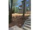 The exterior reveals a modern home with an open balcony, enhanced by newly installed landscaping at 150 Driftwood Dr, Mooresville, NC 28117
