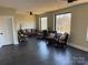 Spacious living room with lots of natural light, ceiling fans, and plenty of seating at 150 Driftwood Dr, Mooresville, NC 28117
