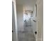 Walk-in shower room featuring a full wall tile accent, slate floor and rainfall shower head at 150 Driftwood Dr, Mooresville, NC 28117
