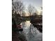 Beautiful waterfront view with boats docked along the canal reflecting a scenic and peaceful ambiance at 150 Driftwood Dr, Mooresville, NC 28117