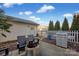 Small backyard with patio, grill, and fire pit at 156 Singleton Rd, Mooresville, NC 28117