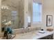 Bathroom features marble countertop and a glass shower at 156 Singleton Rd, Mooresville, NC 28117