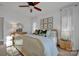 King-size bed in a well-lit bedroom with light wood furniture at 156 Singleton Rd, Mooresville, NC 28117