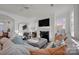 Open living room with fireplace and large TV at 156 Singleton Rd, Mooresville, NC 28117