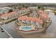 Aerial view of waterfront community featuring luxury condos and an in-ground pool at 17931 Kings Point Dr # G, Cornelius, NC 28031