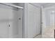 Bathroom with shower and glass door, and linen closet at 17931 Kings Point Dr # G, Cornelius, NC 28031