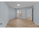 Bedroom featuring plush carpeting, window and neutral paint at 17931 Kings Point Dr # G, Cornelius, NC 28031