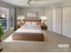 Bright bedroom features a ceiling fan, closet, and large window with natural light at 17931 Kings Point Dr # G, Cornelius, NC 28031