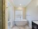 Luxurious bathroom with soaking tub, shower, and double vanity at 1903 46Th Avenue Ne Dr, Hickory, NC 28601