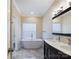 Elegant bathroom with soaking tub and double vanity at 1903 46Th Avenue Ne Dr, Hickory, NC 28601