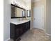Modern bathroom with double sinks and large mirror at 1903 46Th Avenue Ne Dr, Hickory, NC 28601