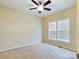 Spacious bedroom with ceiling fan and neutral carpeting at 1903 46Th Avenue Ne Dr, Hickory, NC 28601