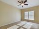 Spacious bedroom with ceiling fan and neutral carpeting at 1903 46Th Avenue Ne Dr, Hickory, NC 28601