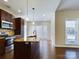 Modern kitchen with dark cabinets and granite island at 1903 46Th Avenue Ne Dr, Hickory, NC 28601
