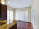 Eat-in kitchen with granite countertop and access to backyard at 1903 46Th Avenue Ne Dr, Hickory, NC 28601