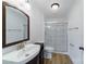 Clean bathroom, featuring a walk-in shower and updated vanity at 2085 Faith Rd, Salisbury, NC 28146