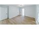 Bright bedroom with hardwood floors and access to another room at 2085 Faith Rd, Salisbury, NC 28146