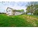 Back of the house showing a deck and a large backyard at 2085 Faith Rd, Salisbury, NC 28146