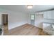 Kitchen area with light wood flooring and access to another room at 2085 Faith Rd, Salisbury, NC 28146