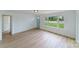 Spacious living area featuring light wood floors and a green front door at 2085 Faith Rd, Salisbury, NC 28146