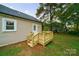 Small wooden deck off back of house with steps at 2500 S Ridge Ave, Kannapolis, NC 28083