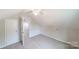 Spacious bedroom with carpet and access to another room at 2500 S Ridge Ave, Kannapolis, NC 28083