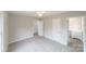 Bedroom with carpet flooring and access to a bathroom at 2500 S Ridge Ave, Kannapolis, NC 28083