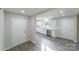 Bright entryway with view into kitchen and hardwood floors at 2500 S Ridge Ave, Kannapolis, NC 28083