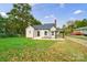 House exterior featuring a beige siding and a covered porch at 2500 S Ridge Ave, Kannapolis, NC 28083