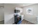 Modern kitchen with white cabinets, granite countertops, and stainless steel appliances at 2500 S Ridge Ave, Kannapolis, NC 28083