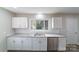 Modern kitchen with white cabinets, granite counters and stainless steel appliances at 2500 S Ridge Ave, Kannapolis, NC 28083