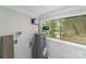 Laundry room with water heater and window at 2500 S Ridge Ave, Kannapolis, NC 28083