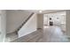 Living room with hardwood floors and open view to kitchen at 2500 S Ridge Ave, Kannapolis, NC 28083