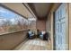 Charming balcony with outdoor seating, perfect for enjoying the view and fresh air at 421 N Church St # 12F, Charlotte, NC 28202