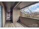 Private balcony overlooking the wooded area, offering a relaxing outdoor space at 421 N Church St # 12F, Charlotte, NC 28202