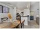 Cozy dining area with a view to the kitchen and living spaces, perfect for seamless entertaining at 421 N Church St # 12F, Charlotte, NC 28202