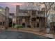 Brick townhouse with a modern design, featuring large windows and landscaping at 421 N Church St # 12F, Charlotte, NC 28202
