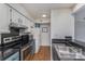Bright kitchen with stainless steel appliances and ample cabinet space, perfect for culinary adventures at 421 N Church St # 12F, Charlotte, NC 28202