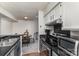 Well-equipped kitchen with stainless steel appliances, offering both functionality and style for cooking enthusiasts at 421 N Church St # 12F, Charlotte, NC 28202
