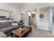 Open concept living room with seamless flow to the kitchen and wet bar, perfect for modern living at 421 N Church St # 12F, Charlotte, NC 28202