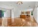 Open kitchen with island, hardwood floors and ample cabinet space at 4601 Mariner Ln, Denver, NC 28037