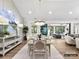 Open concept dining room with table, chandelier, and view into Gathering room at 5053 Townsend Rd, Lancaster, SC 29720