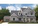 Gray two-story house with white accents and a two-car garage at 5053 Townsend Rd, Lancaster, SC 29720